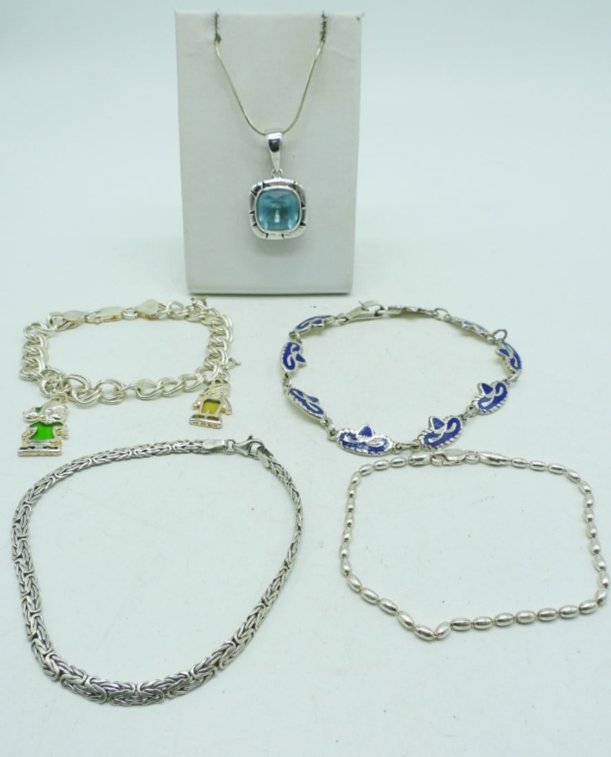 925 Mexico, Blue Topaz, Charm Bracelets: Mexico blue enamel sombrero bracelet, Charm bracelet with two charms and two chain bracelets. 7-8.5". Blue Topaz, sterling necklace 20". (31.8 dwt)
