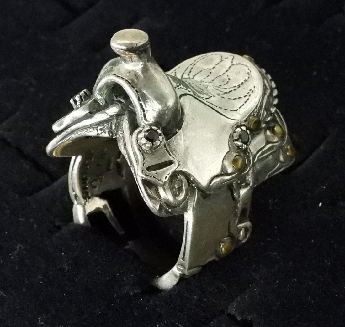 Saddle West 925 Saddle Ring with Gemstones: Saddle West branded, sterling saddle ring with 4 black gemstones. Markings inside are "Saddle West, Sterling, 925, T.J. Size 12.5 (24.5 dwt)