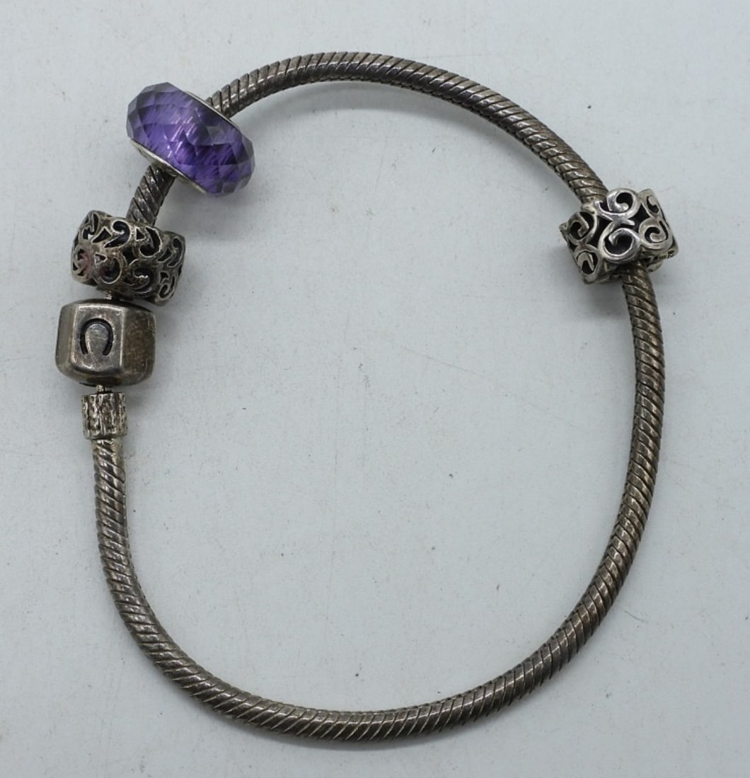 Chamilia 925 Charm Braclet-3 Charms: Chamilia sterling charm bracelet with three charms. 7" Long. (14.6 DWT)