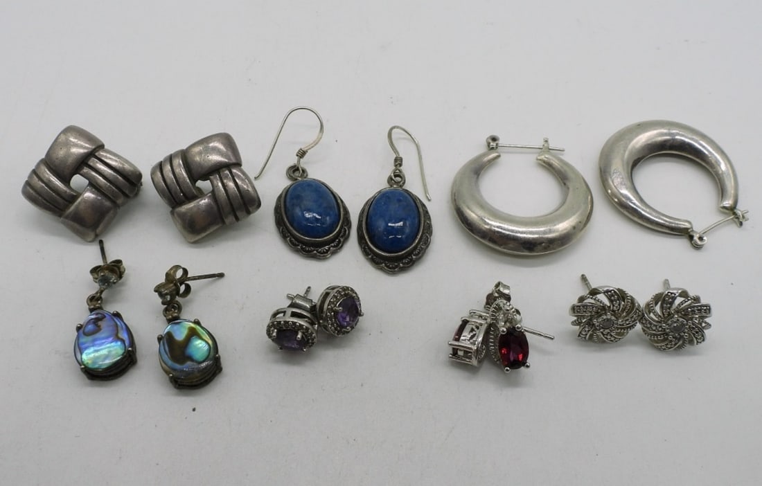 7 Pair of Sterling Earrings, Pierced: Seven pair of sterling pierced earrings. Abalone, Amethyst, Garnet & More. (22 dwt)