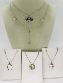 Five Sterling Pendants & Chains