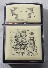 Zippo May 2000 Has A Ship And A  Lighthouse