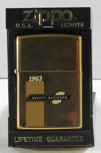 Sealed 1993 Harley Davidson Zippo: Sealed 1993 Harley Davidson Zippo in a case ( gold-tone).