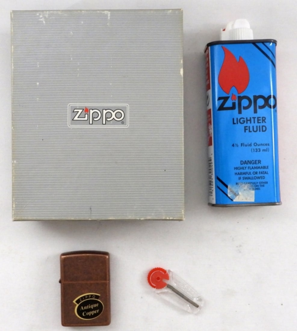 All-In-One Zippo Gift Set Antique Copper: April 1994. New, still in original box. Never fired. It comes with the lighter, lighter fluid, and flint