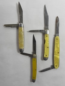4 Small Bone Colored Pocket Knives