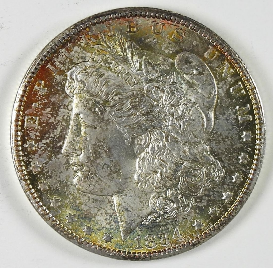 1884-CC MORGAN SILVER DOLLAR: PRETTY TONES on OBV - NICE COIN
