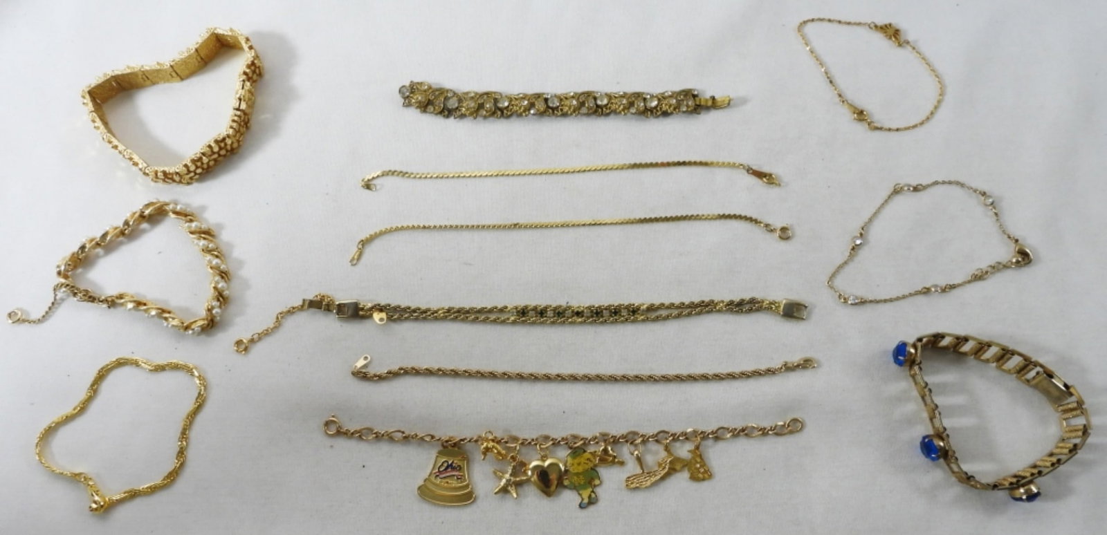 12 Gold-Tone Bracelets: Gold-tone, dainty, very pretty