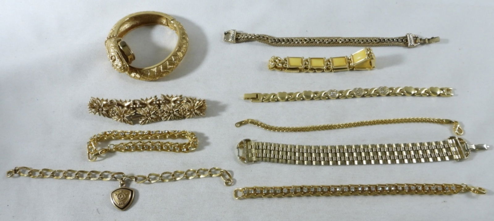 10 Gold-Tone Bracelets: Visit us on Facebook