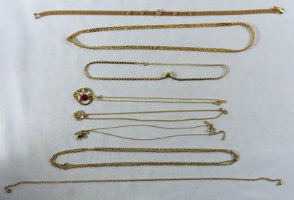 8 Gold-Tone Necklaces