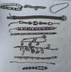 12 Silver-Tone Bracelets
