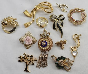 12 Gold-Tone Brooches