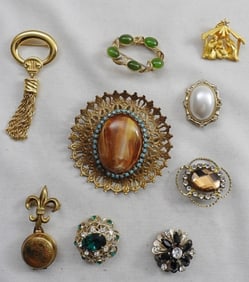 9 Gold-Tone Brooches