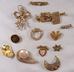 12 Gold-Tone Brooches