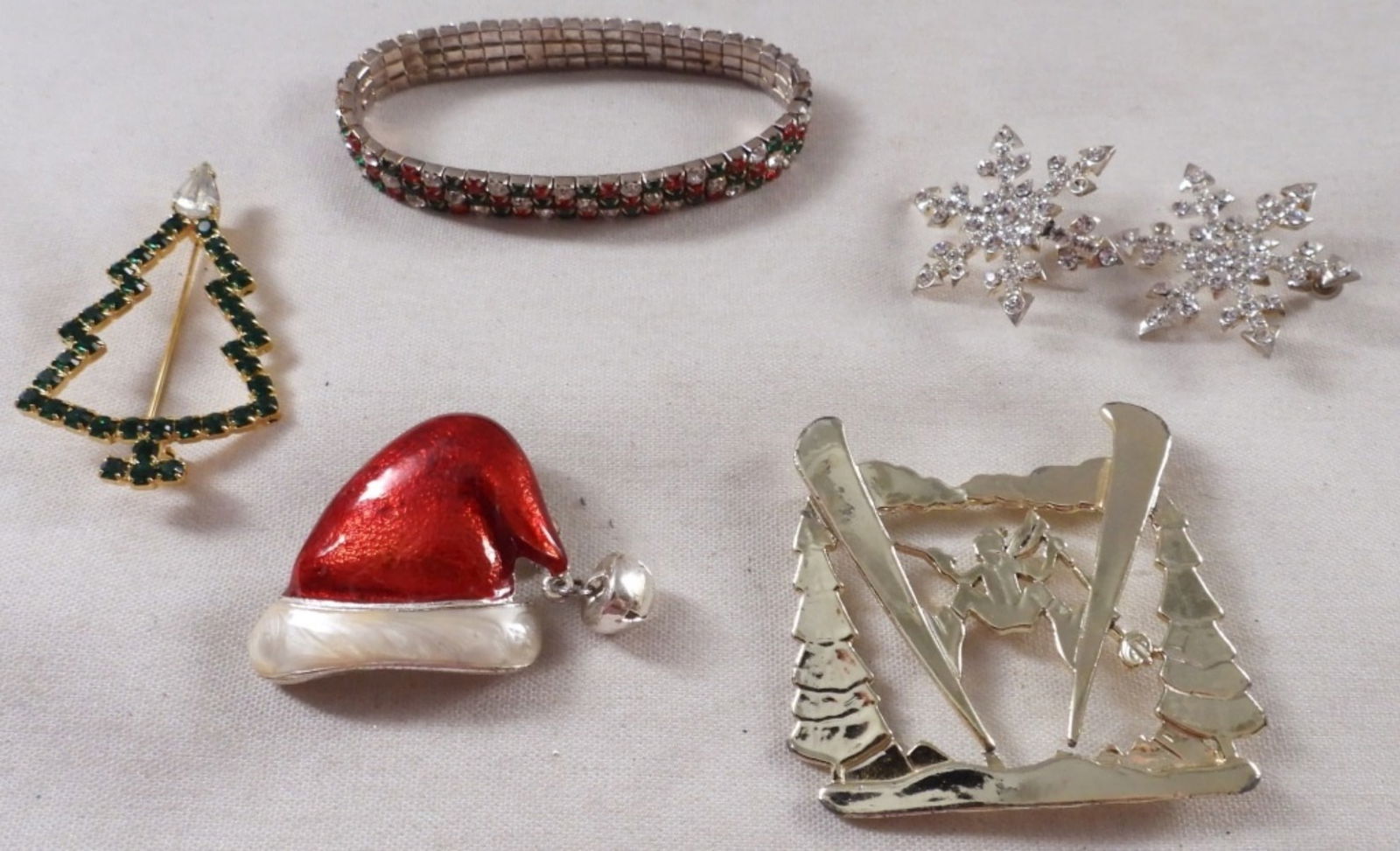 Christmas Time Lot: A pair of snowflake earrings, a bracelet, and 3 brooches