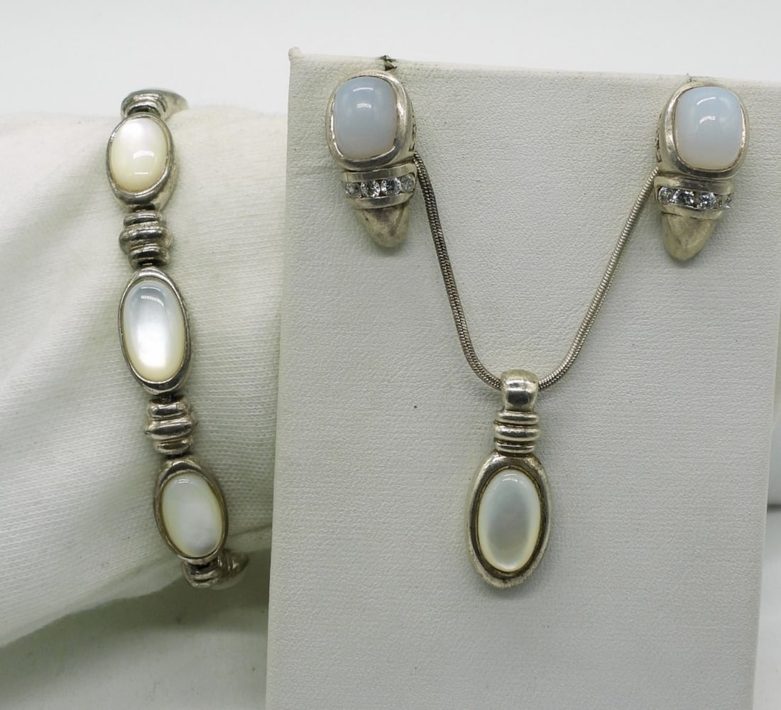 Sterling Mother of Pearl Set: Sterling mother of pearl set, Necklace is 18". Pierced earrings and 7.5" bracelet. (20 dwt)