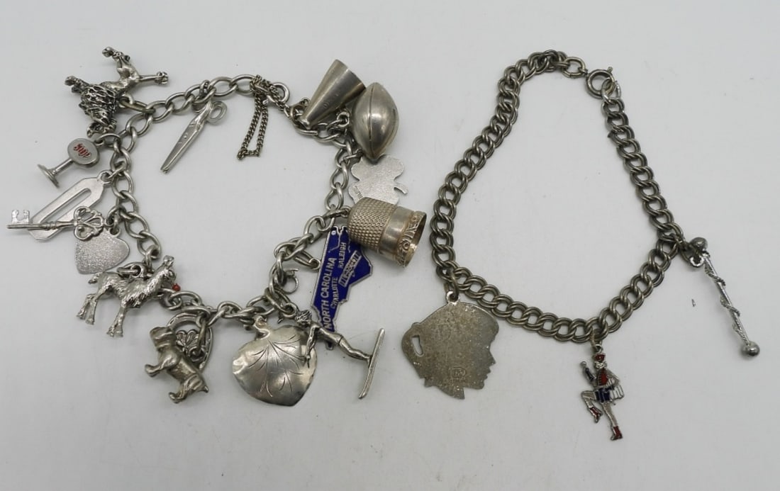 Two Sterling Charm Bracelets: Two sterling 7" charm bracelets. 18 charms. (29 dwt)