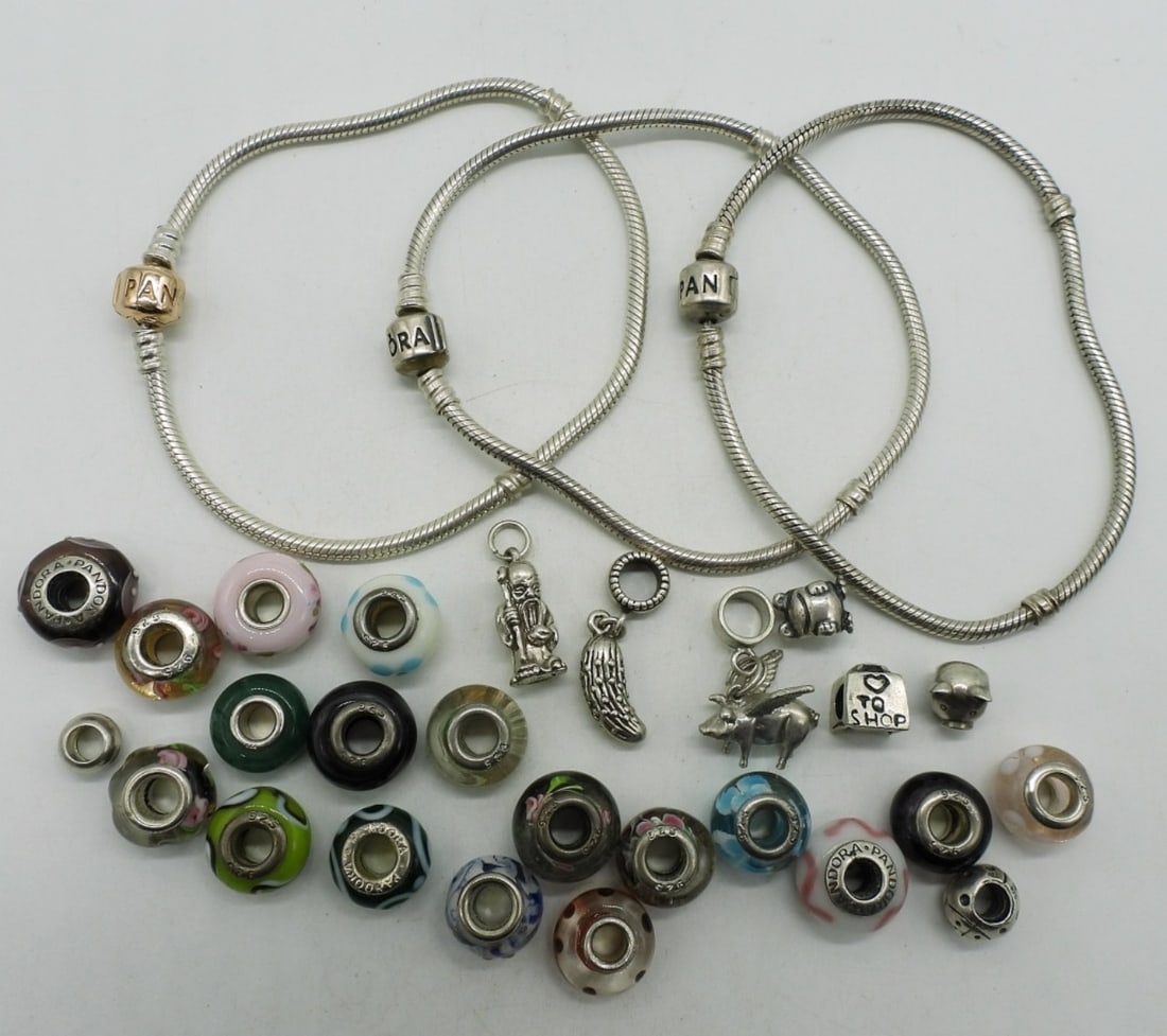 3 Pandora Bracelets & 26 Charms - Sterling: Three sterling pandora charm bracelets, 26 loose Pandora & Ale charms. All marked 925 (55 dwt)