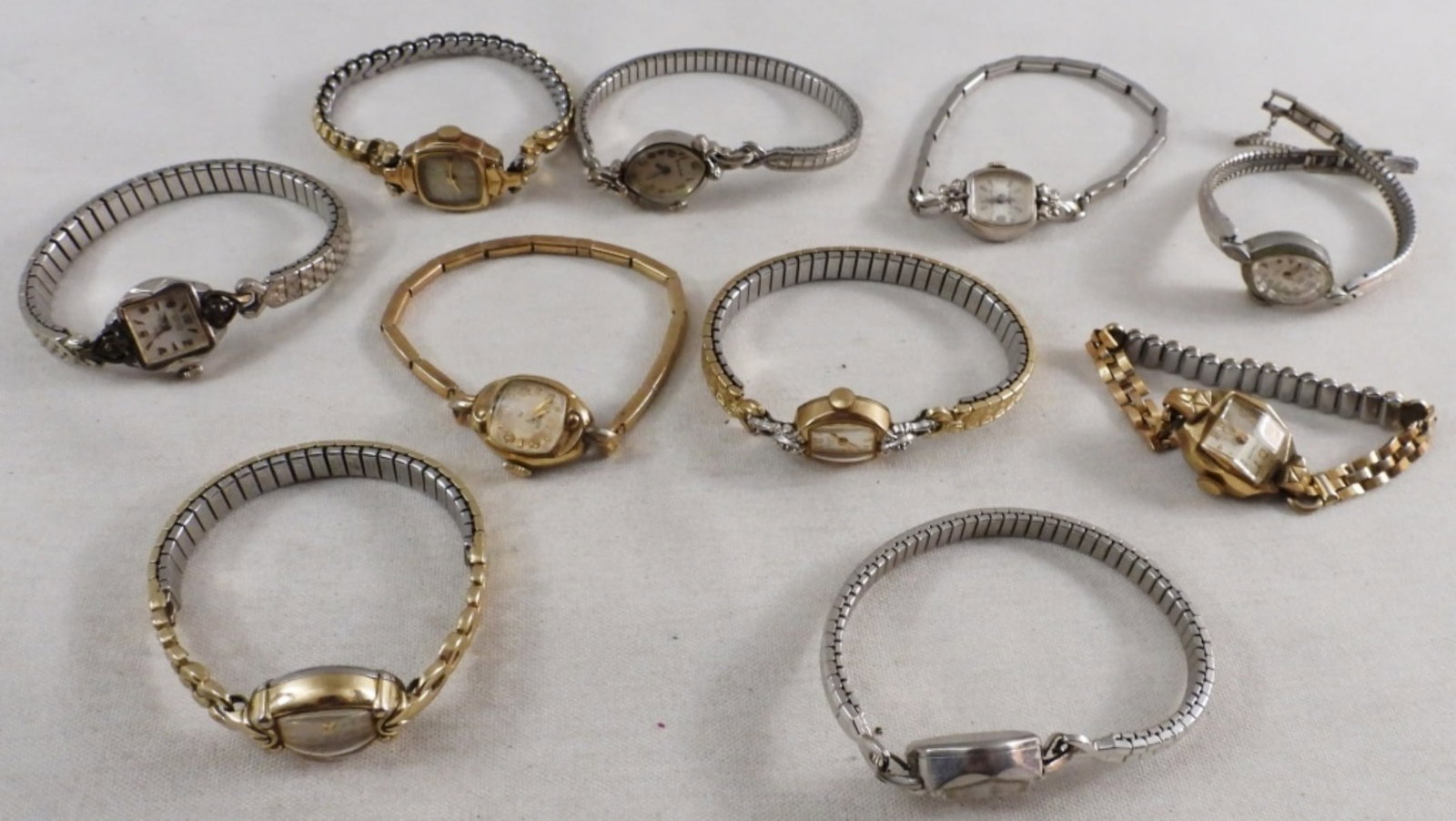 (10) Ladies Better Stretch Band Watches: Watches are not verified, authenticated, or tested in running condition unless specified