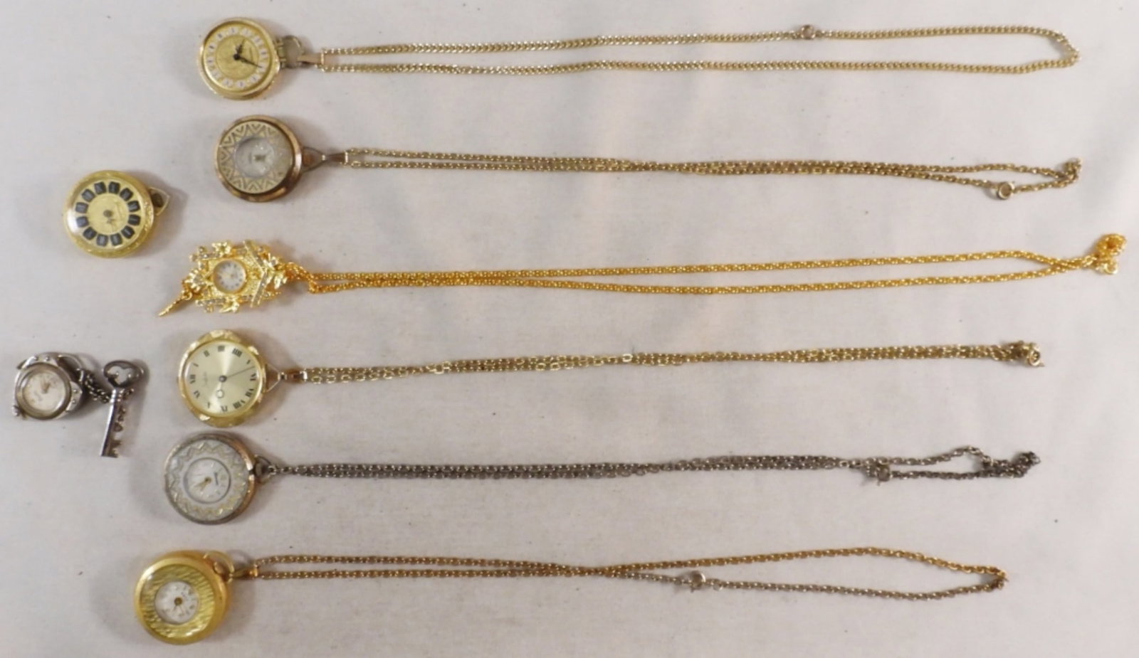 (8) Ladies' Pocket & Brooch Watches: Watches are not verified, authenticated, or tested in running condition unless specified.
