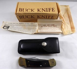 Buck 110 Lockback With A Leather Sheath