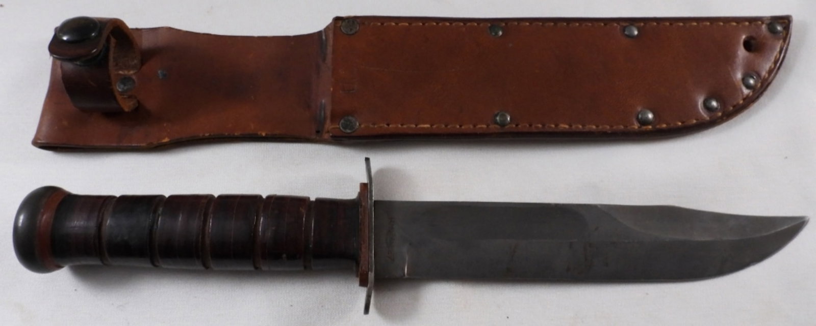 U.S.N. Ka-Bar With Sheath: Snap is oxidized, U.S. Navy, 7" blade