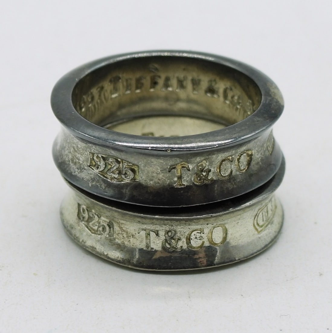 2 Sterling Tiffany & Co Rings: Two sterling Tiffany & Co Rings, Size 8. (6.9 dwt)