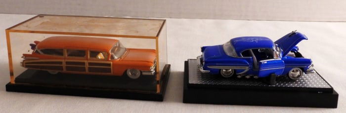 (2) Hot Wheels In A Small Hard Case