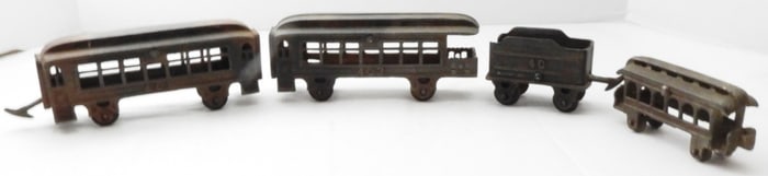 (4) Vintage Cast Iron Train Cars