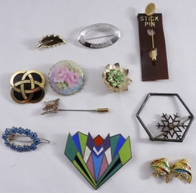 (11) Brooches