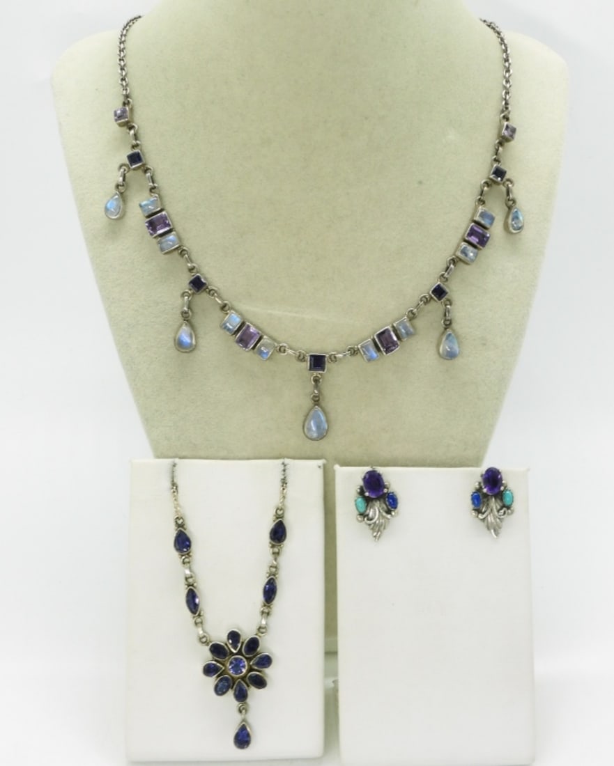 Moonstone & Amethyst 925 Necklaces: Two sterling necklaces with Amethyst and Moonstone gemstones. 16" & 19". One pair of pierced earrings. (26 dwt)