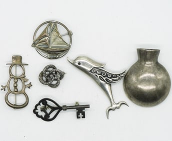Six Sterling Brooches