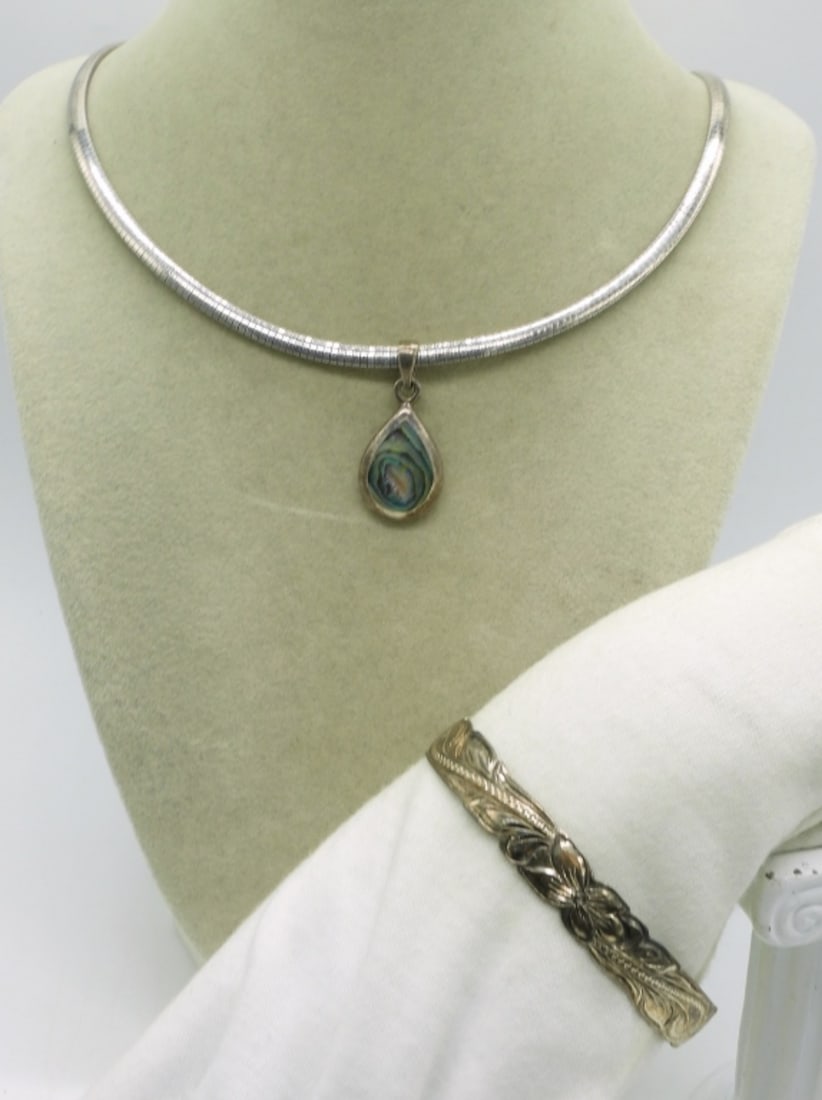 Abalone Sterling Necklace & Bangle Bracelet: Abalone sterling pendant on a 18" chain. Detailed floral sterling bangle bracelet. (27.6 dwt)
