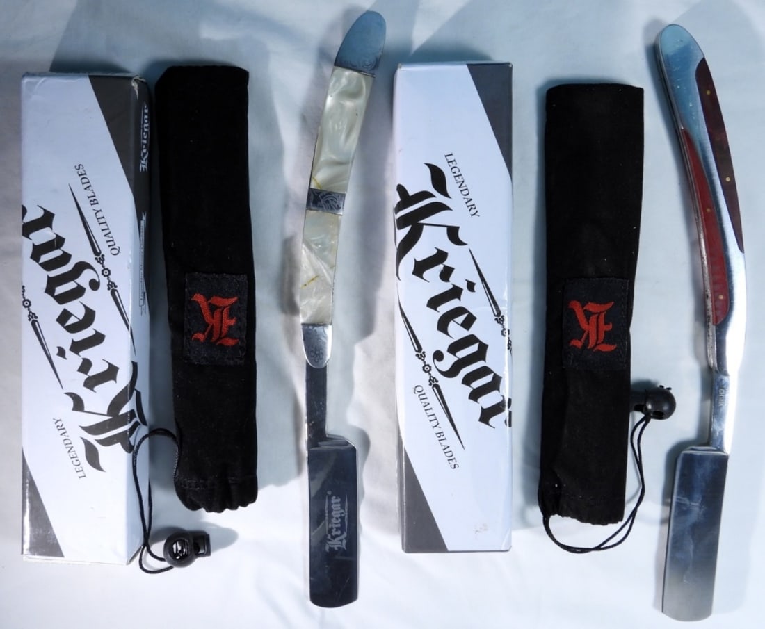 (2) Kriegar Razors: 1) Pearl handle. 2) Red handle both in original packaging