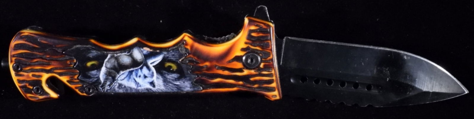 Folding Blade Emergence Knife: Wolf handle. It has a window breaker as well as a seatbelt cutter. blade is loose