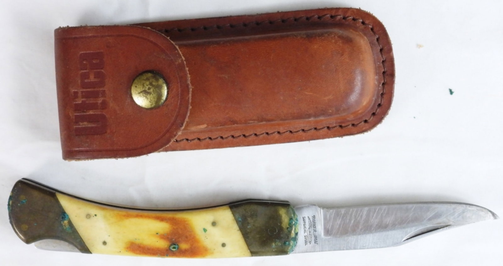 Parker Imai K-139: Stag handle with a brown leather sheath.