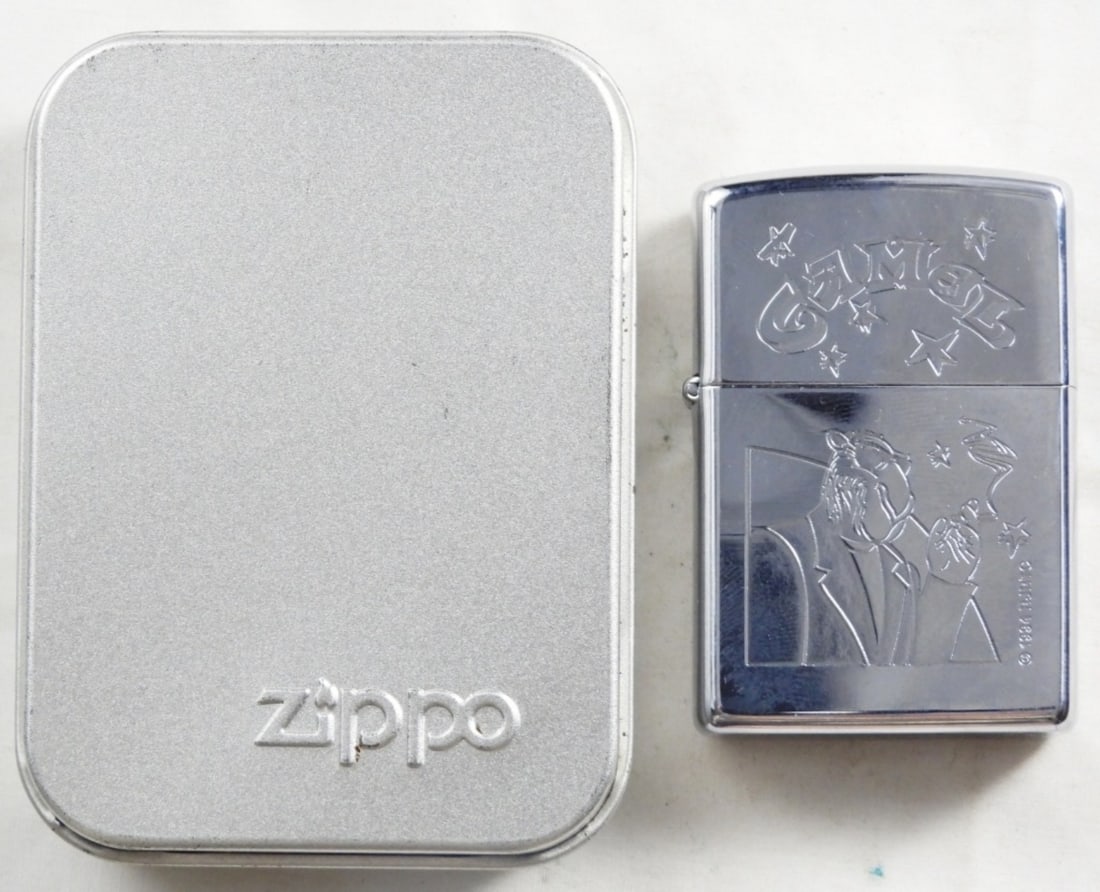 Tuxedo Joe Camel Zippo 1997, Unfired: Unfired, in a tin case. Etched design