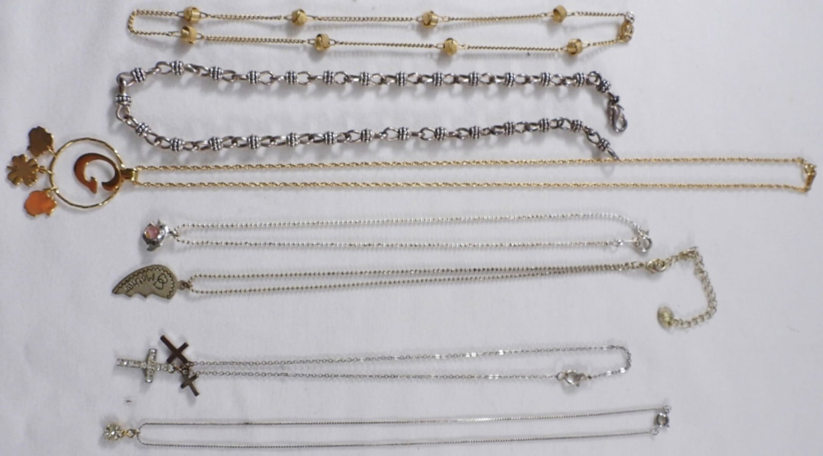(6) Silver-Toned & (1) Gold-Toned Necklace: Unique and beautiful necklaces