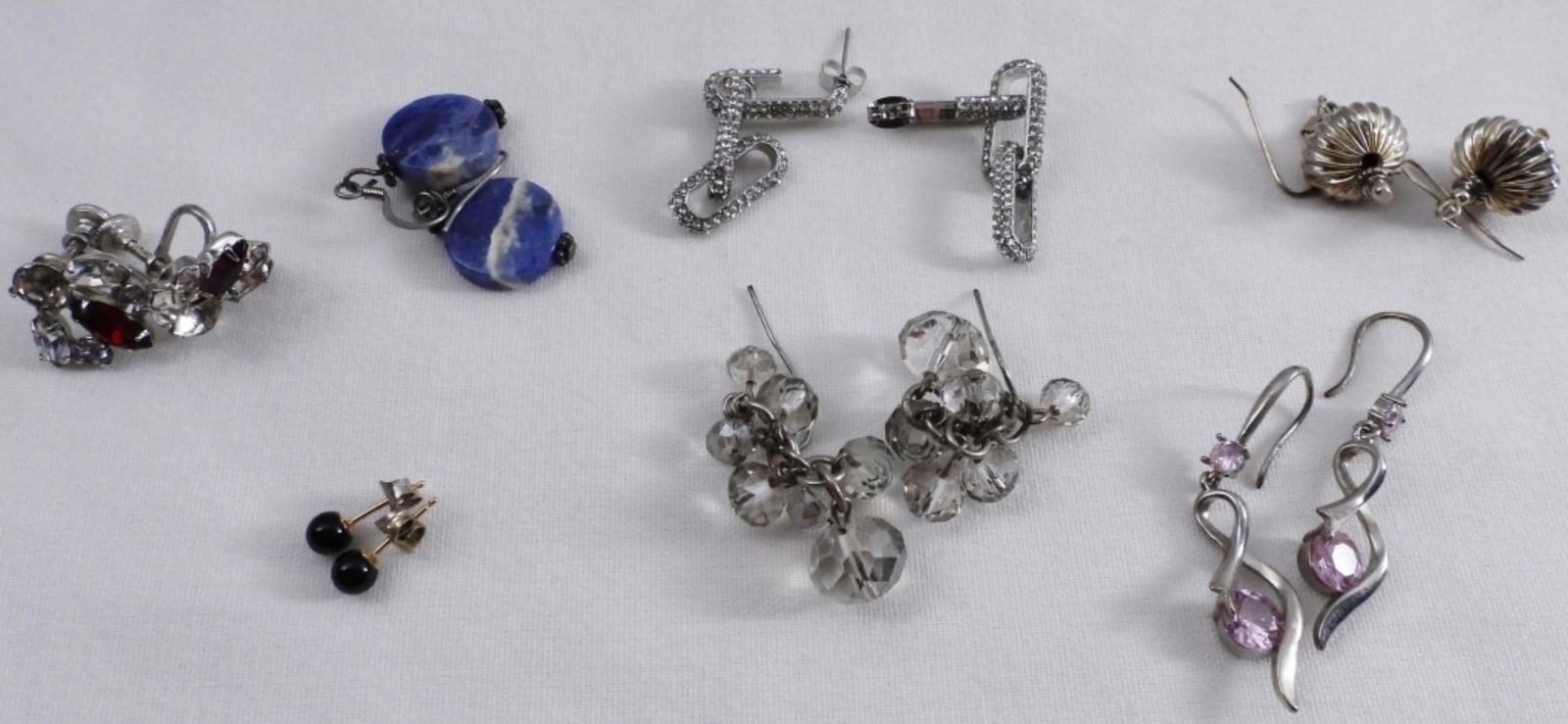(7) Silver-toned Pairs Of Earrings: Different styles