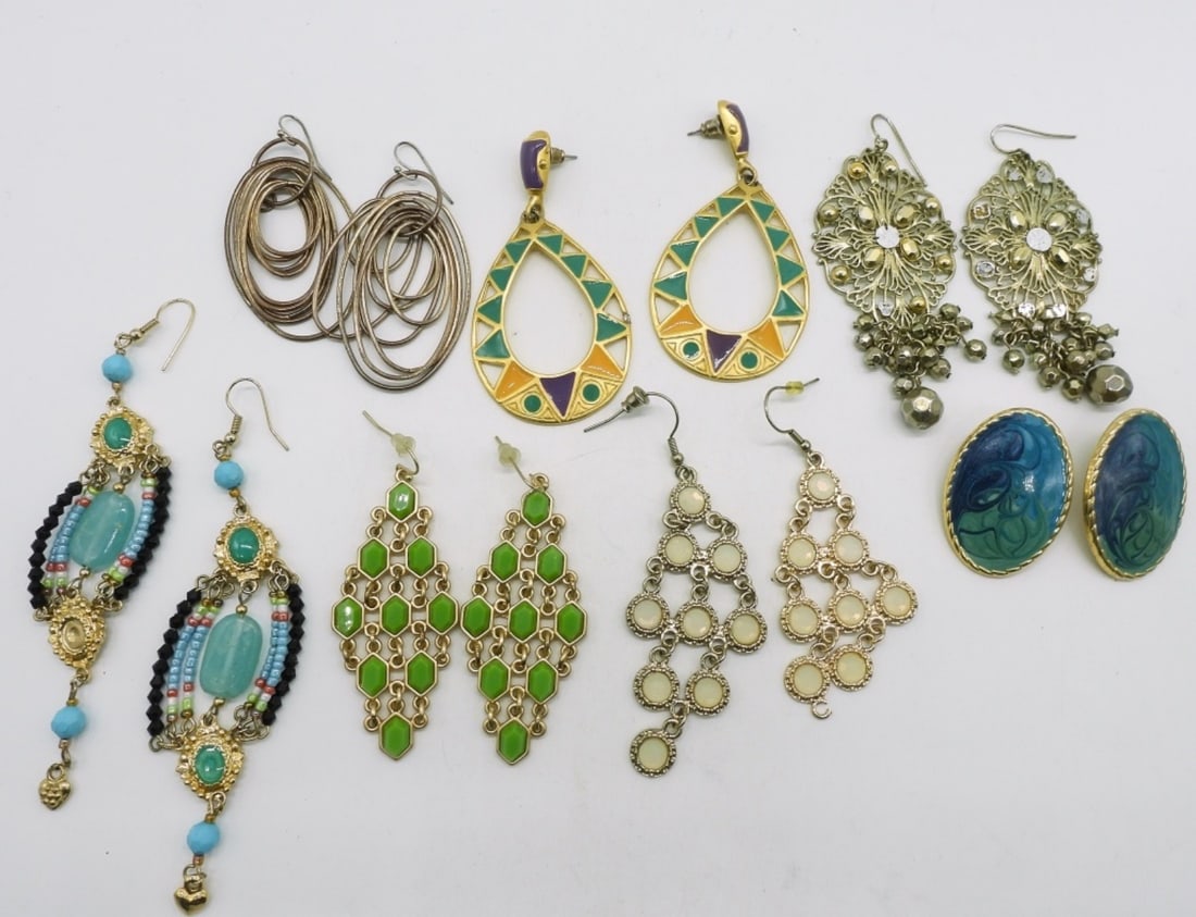 (7) Pair Of Earrings: Multi-colored and beautiful earrings. One pair partially broken.