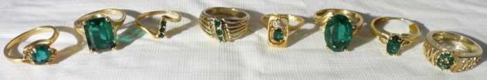 (8) Rings With Green Jewels