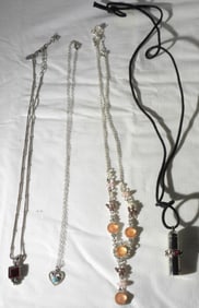 (4) Necklaces With Charms