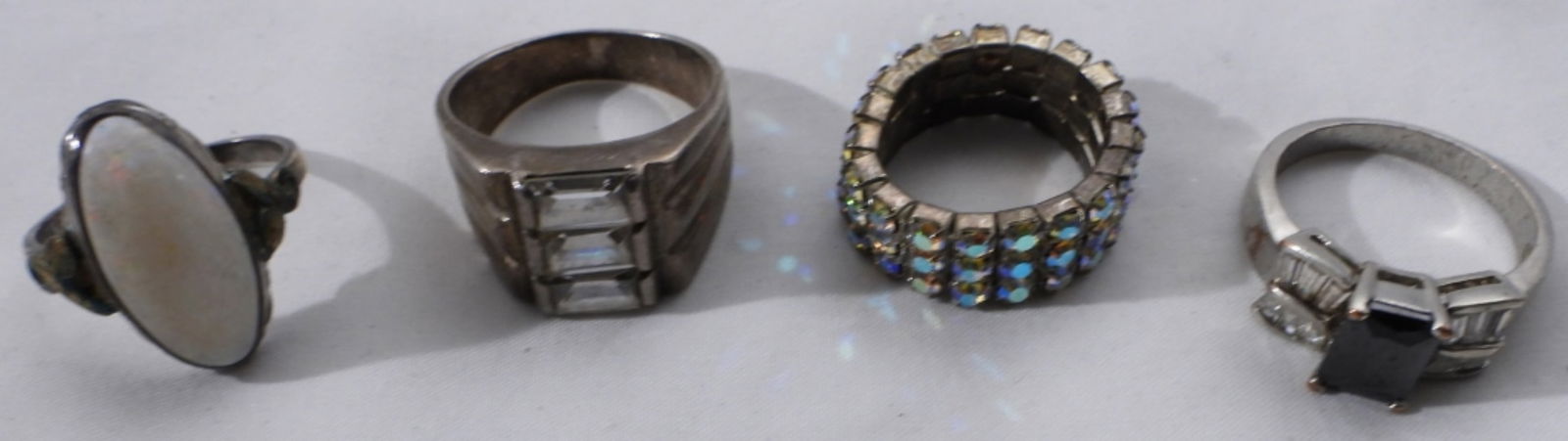 (4) Silver-Tone Rings: various sizes