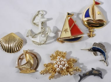 (8) Nodical Brooches