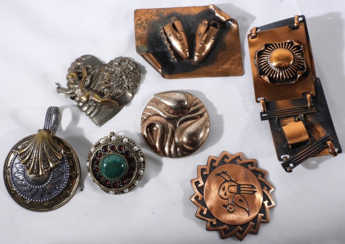 Copper & Brass-Tones Lot: (1) Bracelet. (5) Broaches. (1) Pendant