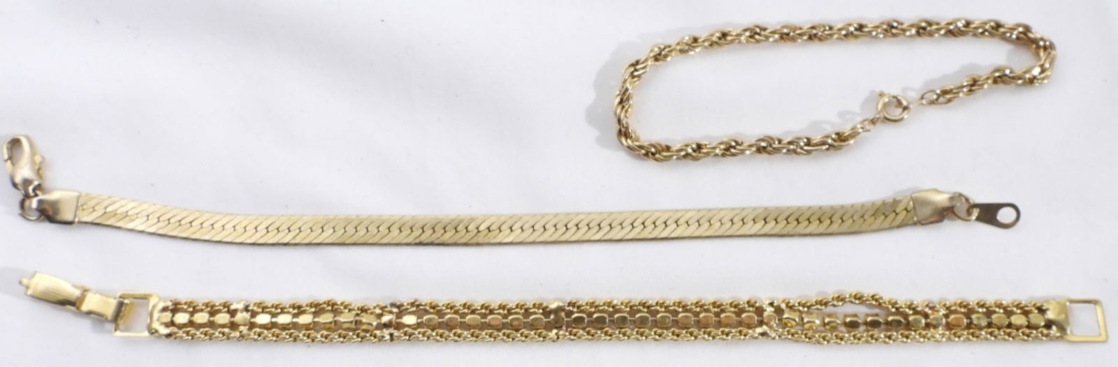 (3) Chain Bracelets: Beautiful gold-tone bracelets