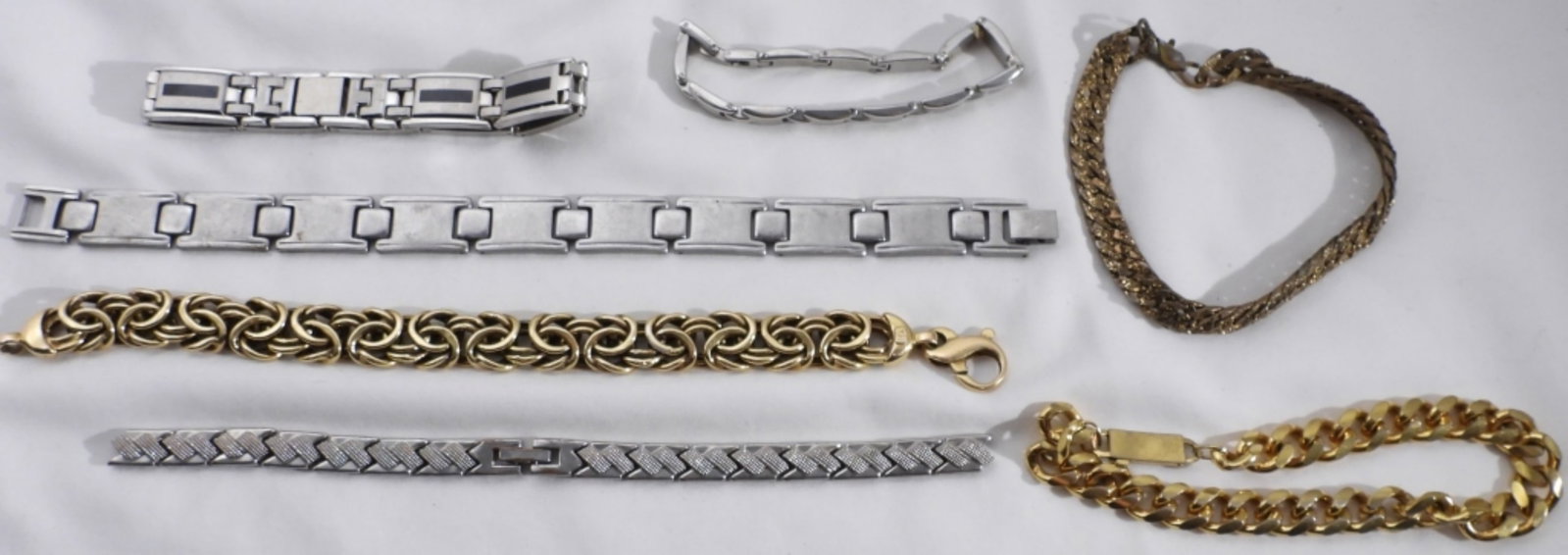 (7) Men's Bracelets: Different types of bracelets, some gold-tone and some silver-tone
