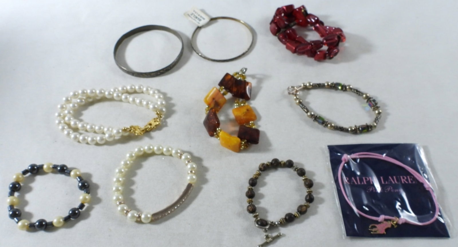 (10) Bracelets: Visit us on Facebook