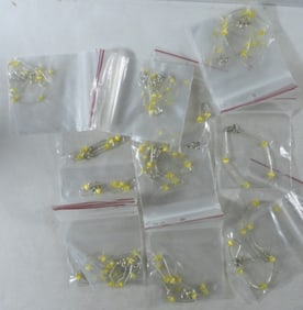 (23) Yellow and Silver-Tone Bracelets