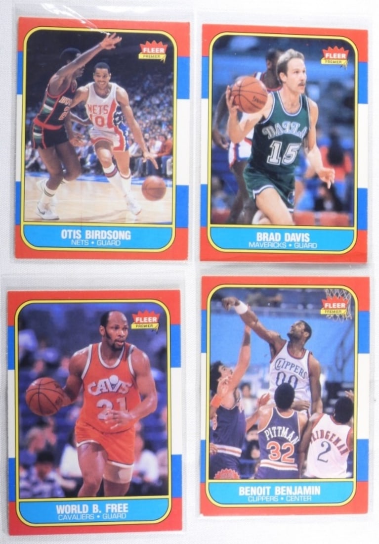(4) Fleer Basketball Cards: 1) Brad Davis # 22 VG. 2) Otis Birdsong #10 VG. 3) Benoit Benjamin #8 VG. 4) World B. Free #35 VG
