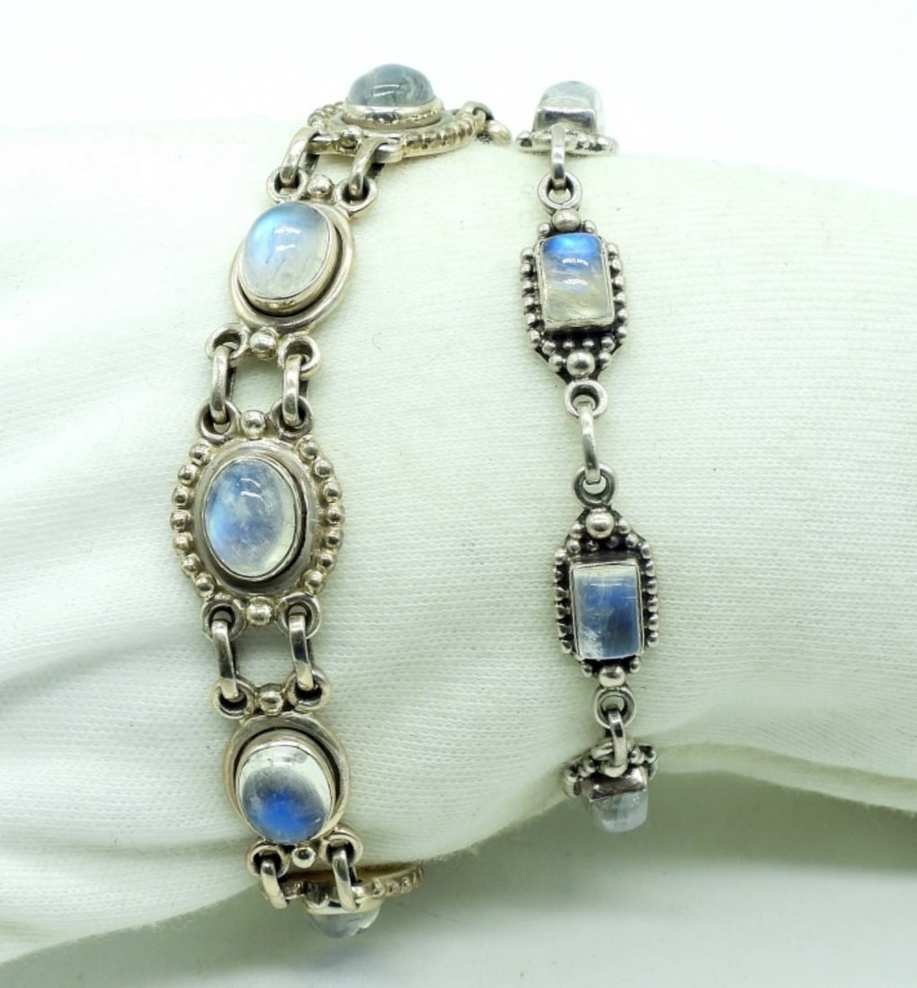 Two Sterling Moonstone Bracelets: Two sterling moonstone bracelets, 6.5" - 8". (22 dwt) (6x4x2)